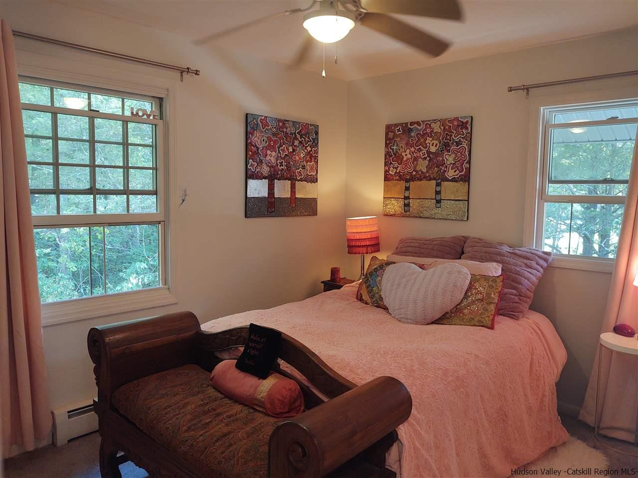 2 Mountain Valley Road Boiceville, NY 12412 - Photo 21 of 35 a bedroom with a bed and wooden floor