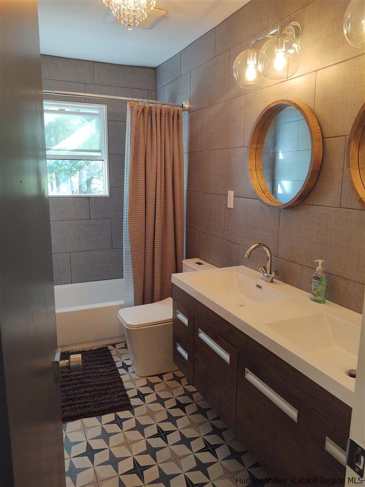 2 Mountain Valley Road Boiceville, NY 12412 - Photo 31 of 35 a bathroom with a sink a toilet and bathtub