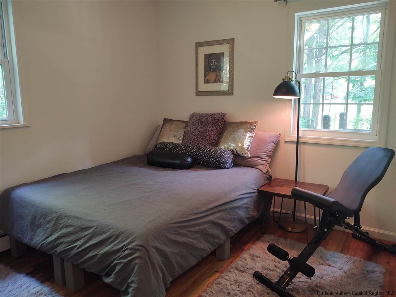 2 Mountain Valley Road Boiceville, NY 12412 - Photo 34 of 35 a bedroom with a bed a window and chair