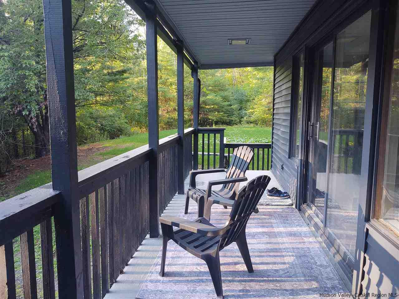 2 Mountain Valley Road Boiceville, NY 12412 - Photo 7 of 35 a view of a porch with furniture and wooden deck
