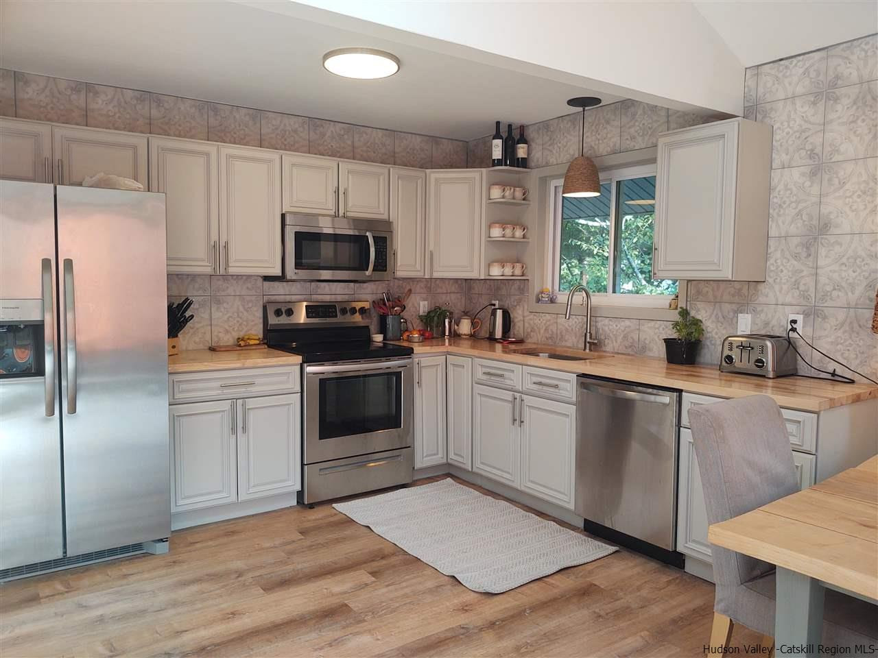 2 Mountain Valley Road Boiceville, NY 12412 - Photo 10 of 35 a kitchen with a white stove top oven and refrigerator