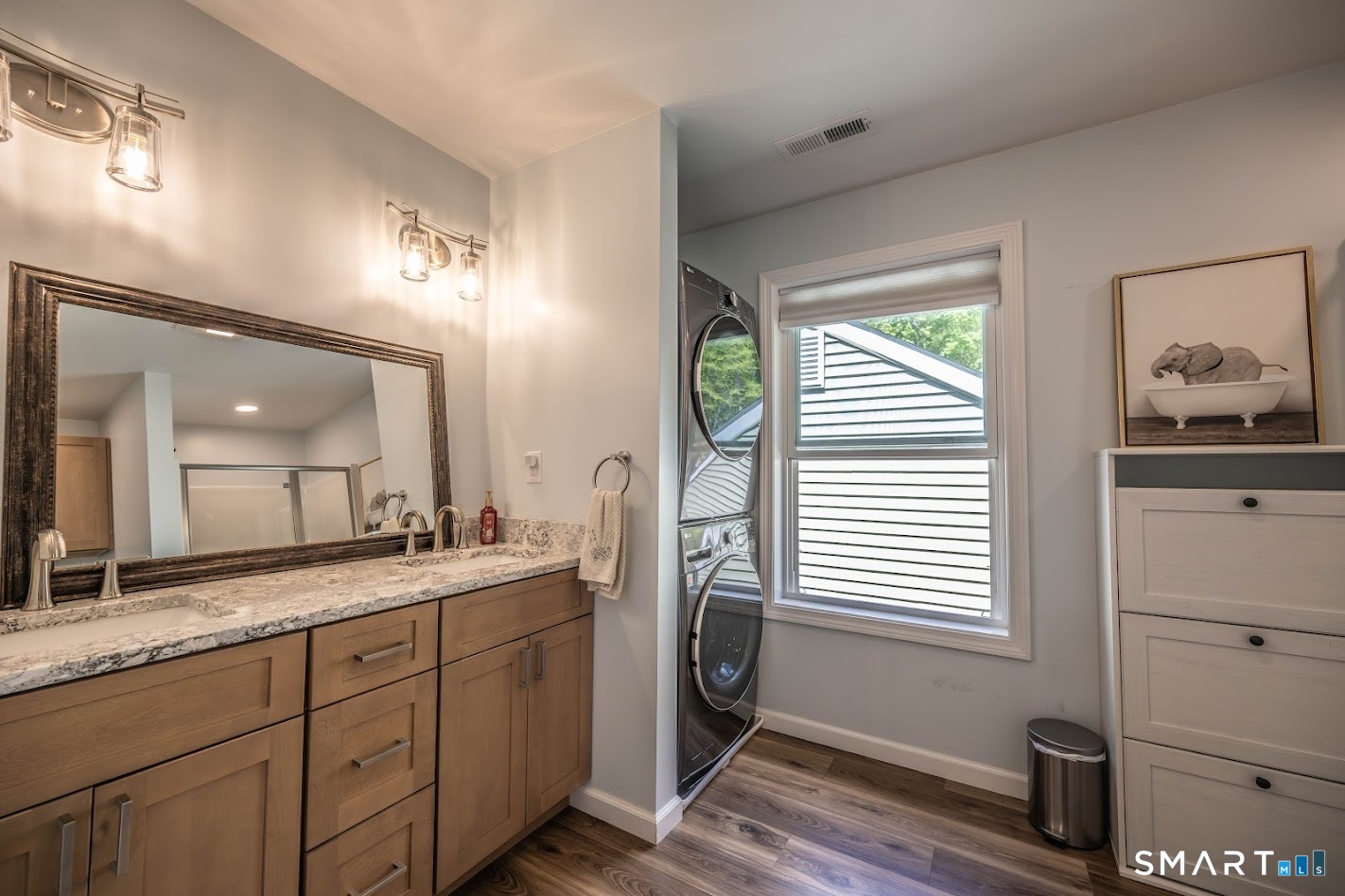 394 Brainard Hill Road Haddam, CT 06441 - Photo 13 of 23 a spacious bathroom with a granite countertop sink mirror and a window