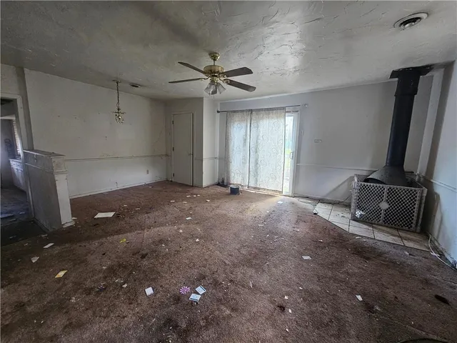 en empty room with windows