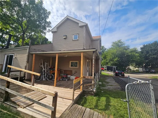 a view of a house with a street