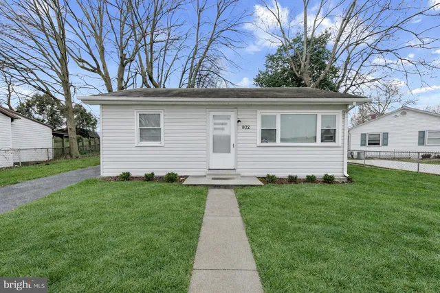 a front view of house with yard