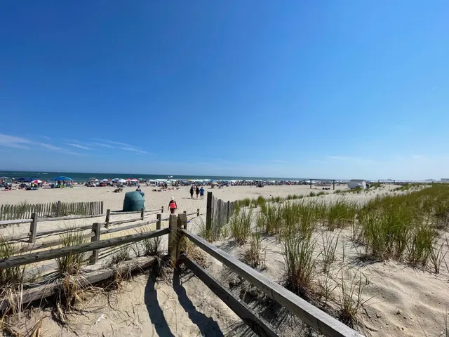 a view of a balcony with wooden floor and city view
