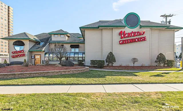a view of a house with a swimming pool