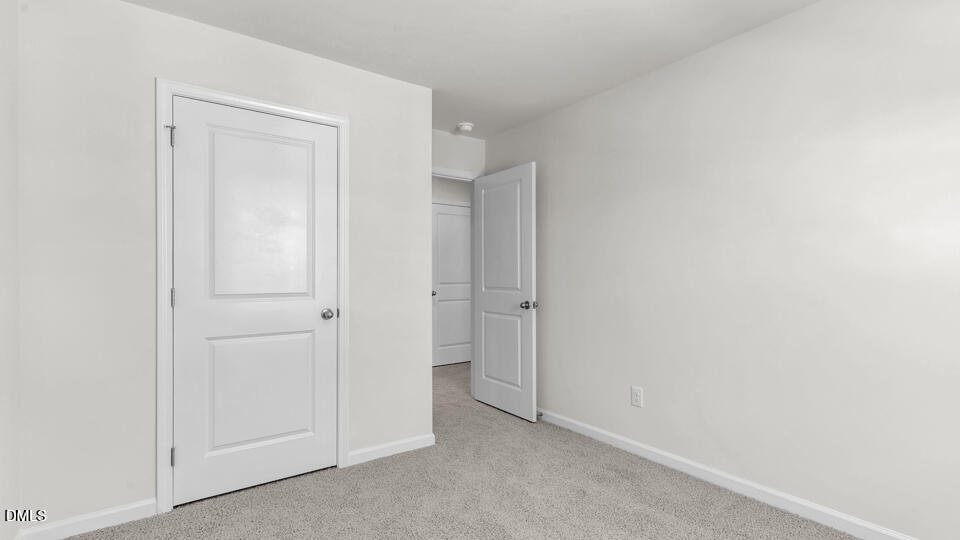 552 Stream Walk Crossing Wendell, NC 27591 - Photo 25 of 42 a view of an empty room