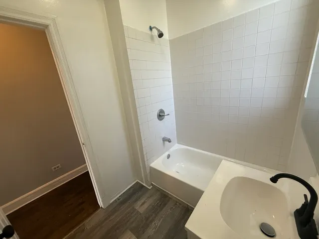 a bathroom with a sink and a tub