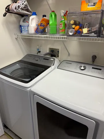 a view of a livingroom with furniture