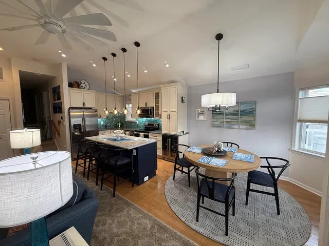 a view of a livingroom with furniture and a fireplace