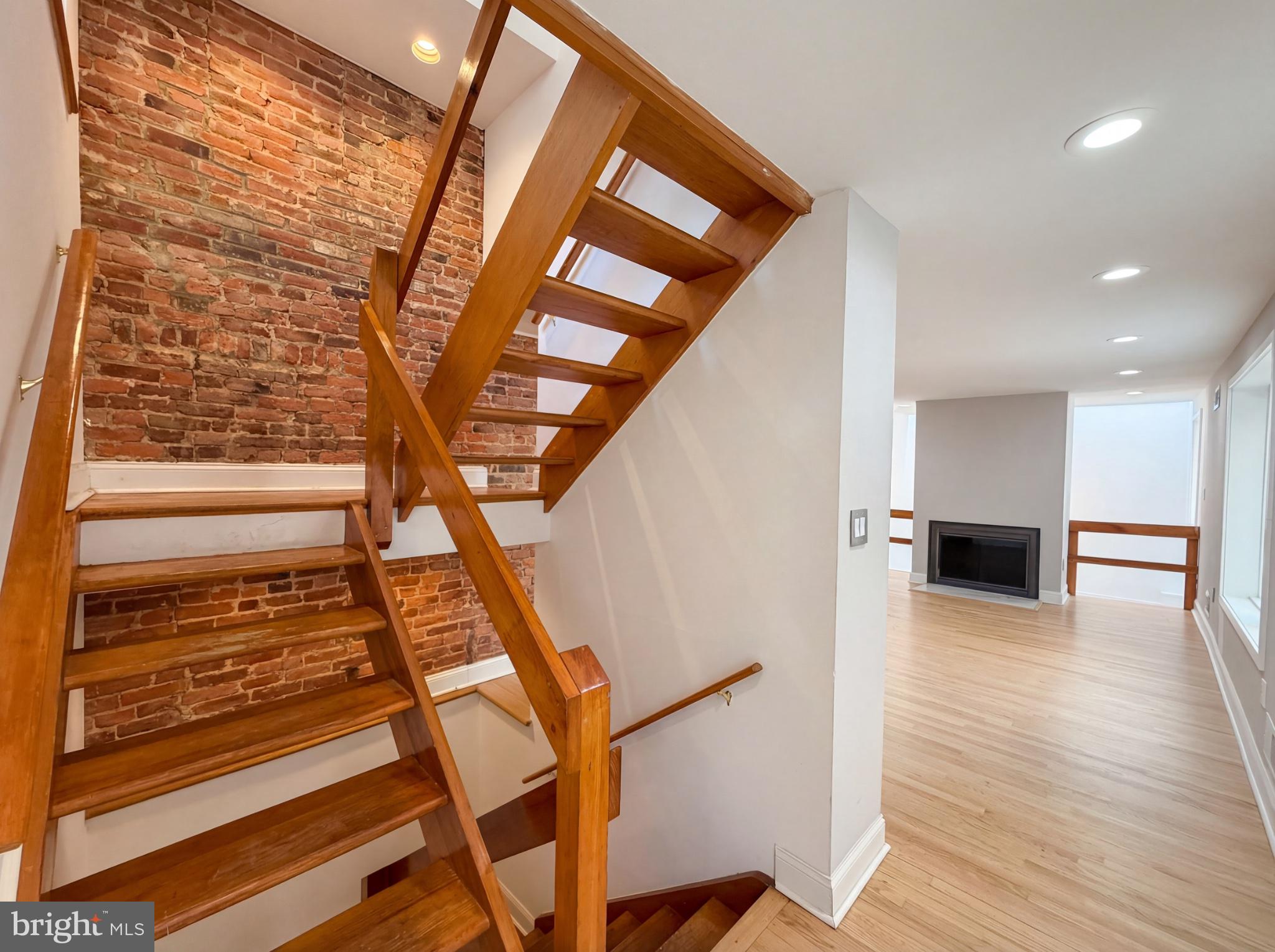 724 13th Street Northeast Washington, DC 20002 - Photo 13 of 20 Charming staircase with exposed brick.