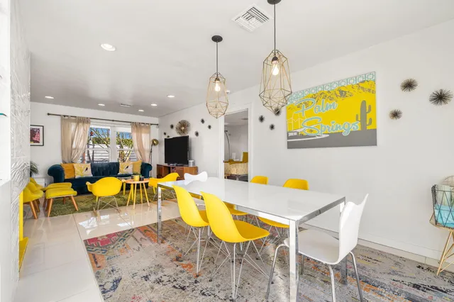 a view of a kitchen and dining room