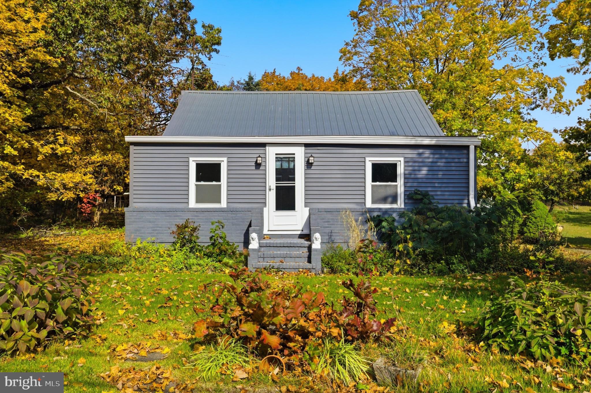 280 Qtn Marlboro Road Salem, NJ 08079 - Photo 1 of 37 a front view of a house with a garden