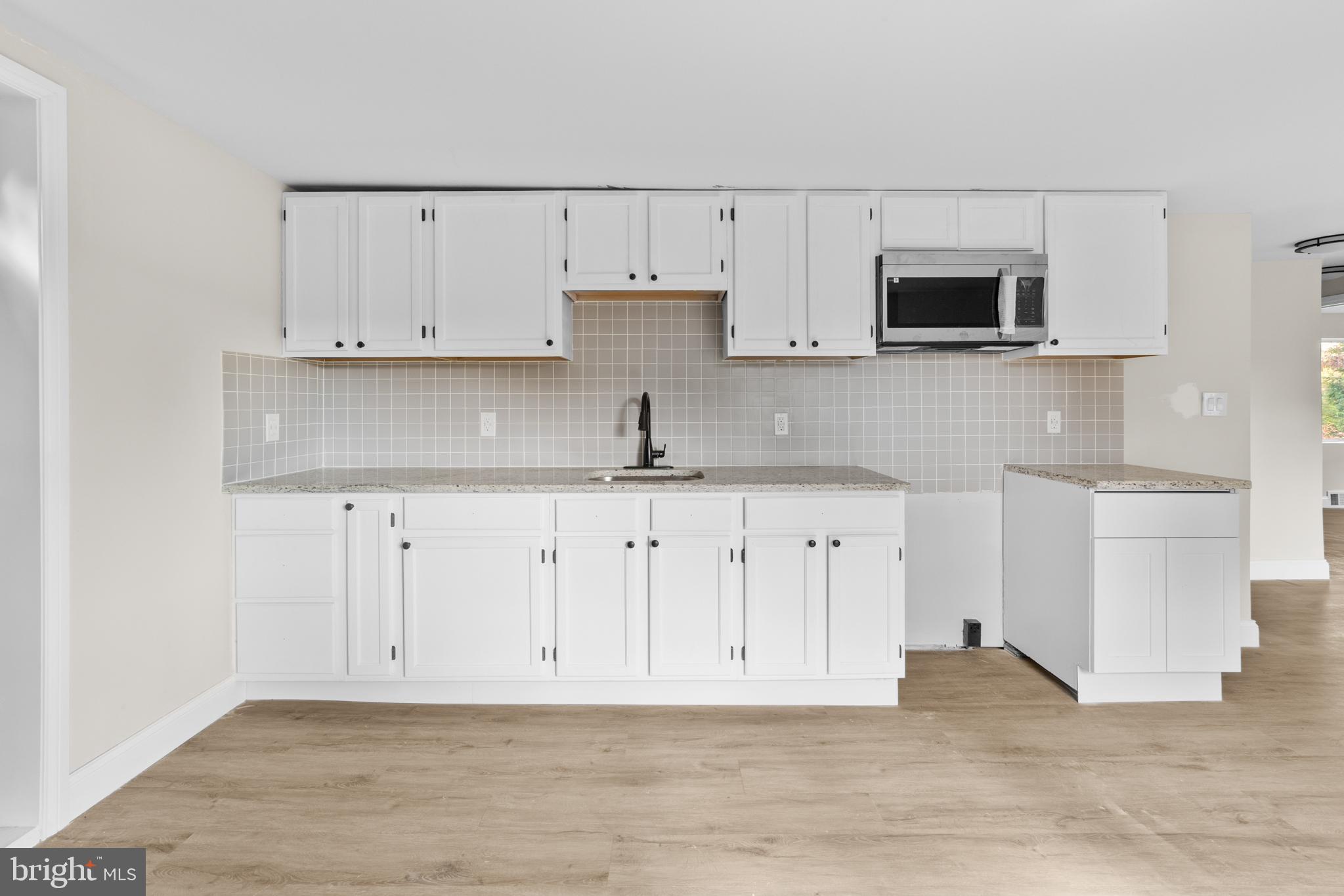 280 Qtn Marlboro Road Salem, NJ 08079 - Photo 18 of 37 a view of kitchen with granite countertop stainless steel appliances a sink and a counter space