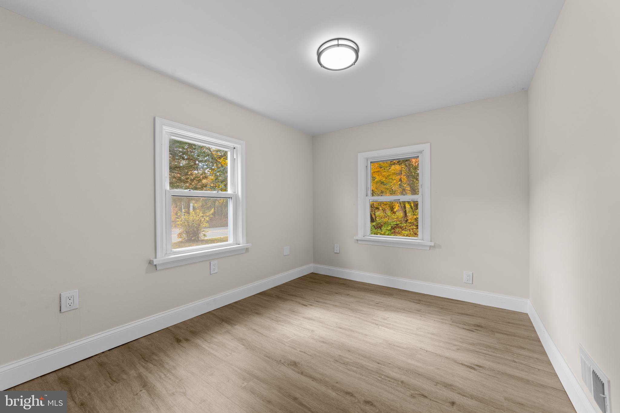 280 Qtn Marlboro Road Salem, NJ 08079 - Photo 21 of 37 wooden floor in an empty room with a window
