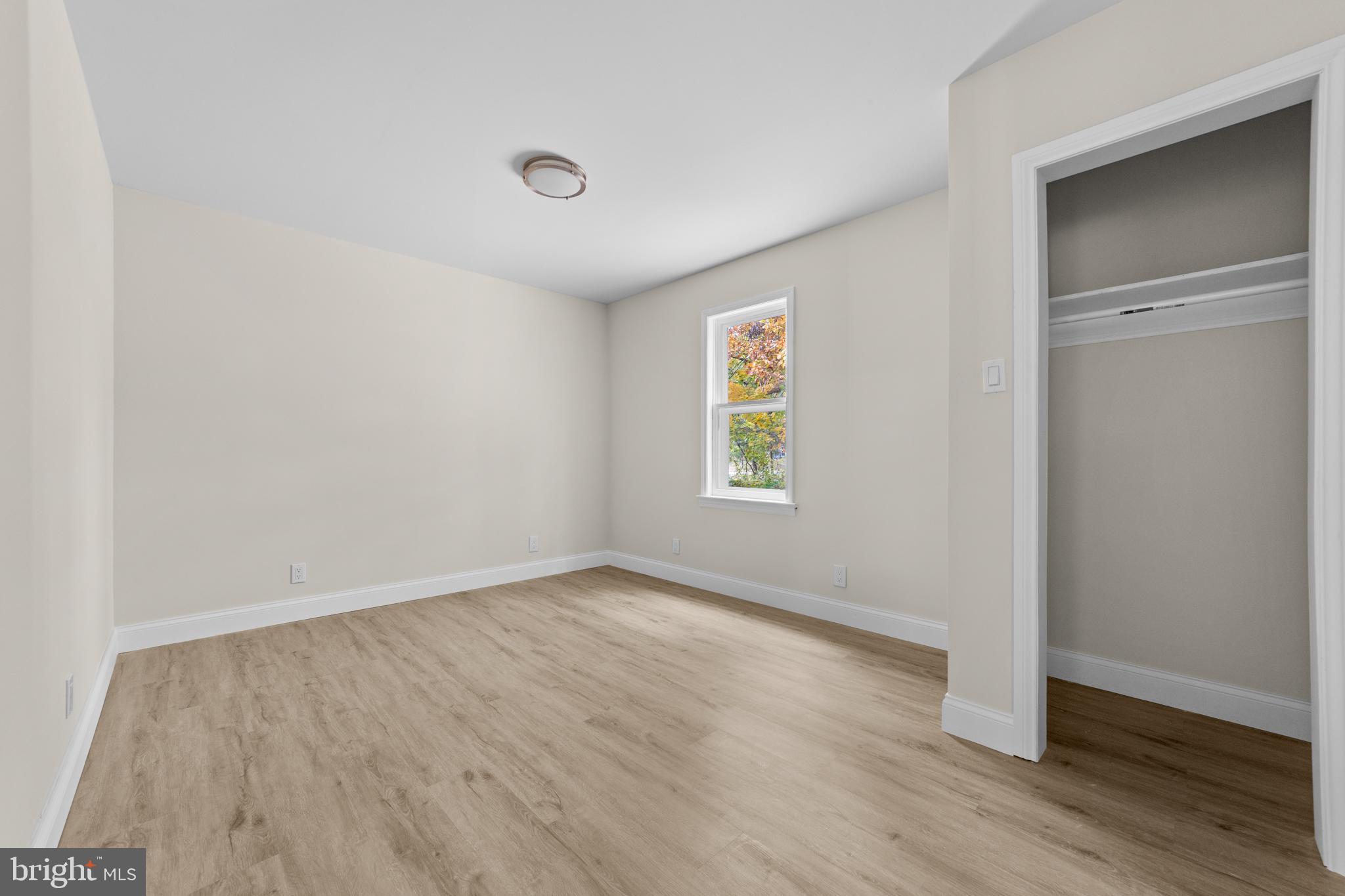 280 Qtn Marlboro Road Salem, NJ 08079 - Photo 22 of 37 an empty room with wooden floor and windows