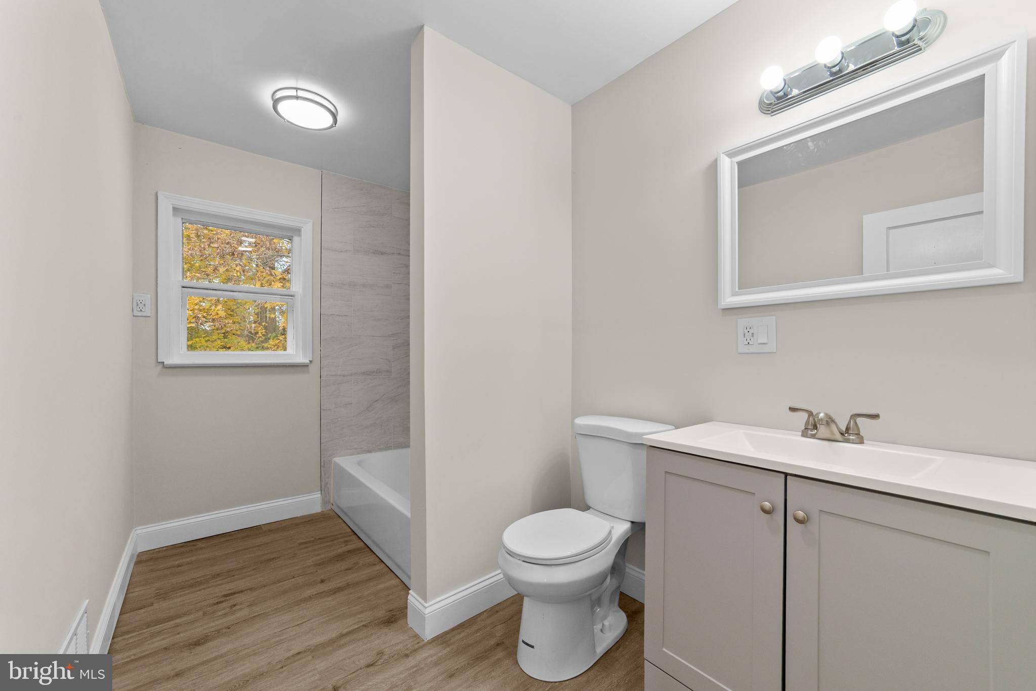 280 Qtn Marlboro Road Salem, NJ 08079 - Photo 23 of 37 a bathroom with a toilet sink and vanity