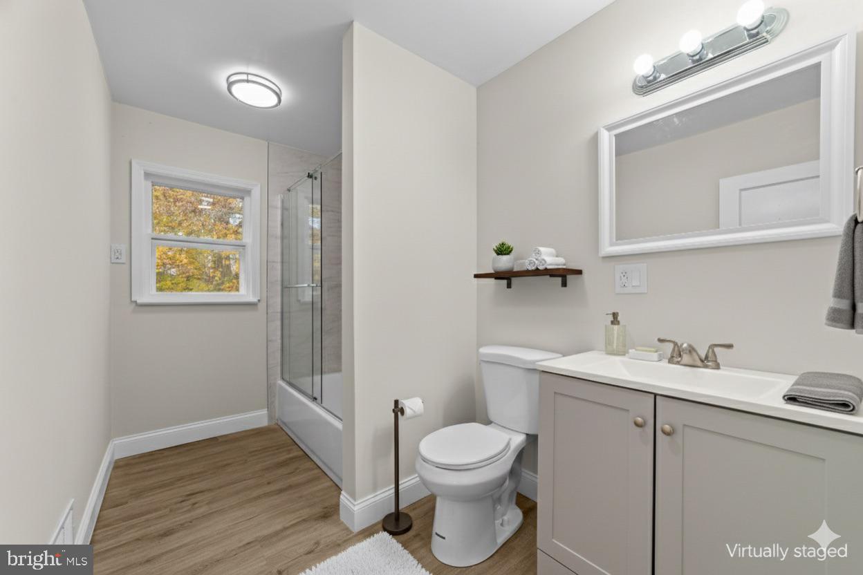 280 Qtn Marlboro Road Salem, NJ 08079 - Photo 24 of 32 a bathroom with a toilet sink and vanity