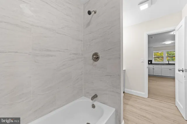 a bathroom with a bathtub