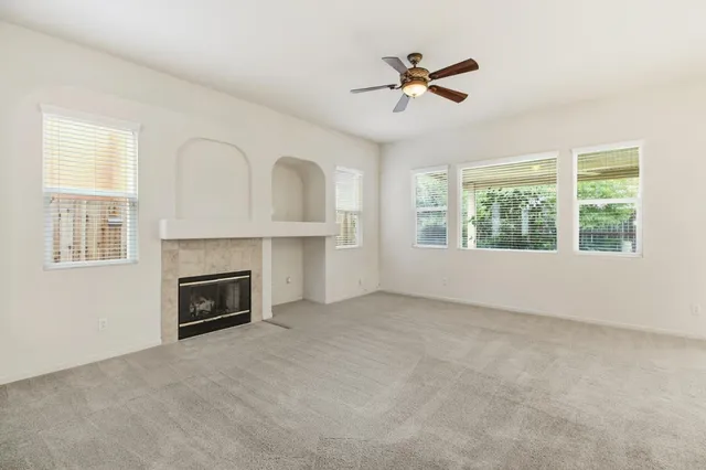 a kitchen with a sink cabinets and appliances