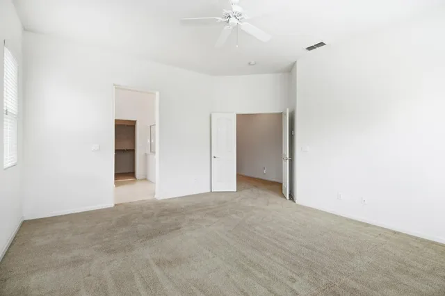 a view of a room with racks on the wall