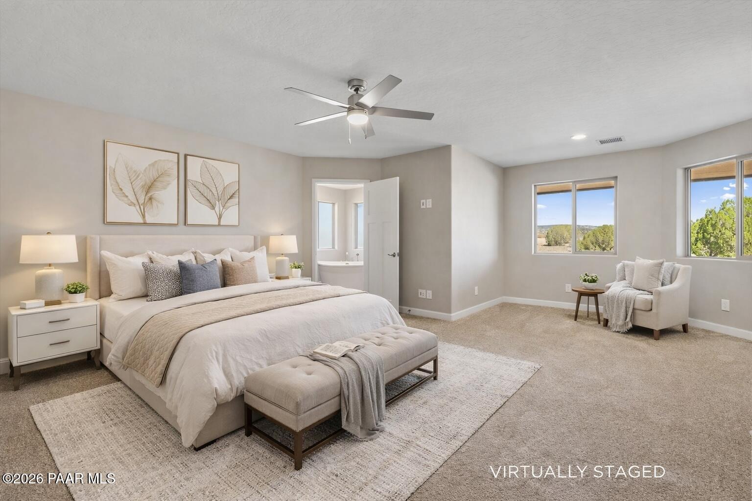 1220 East Cougar Ridge Road Paulden, AZ 86334 - Photo 15 of 30 a spacious bedroom with a bed and a couch