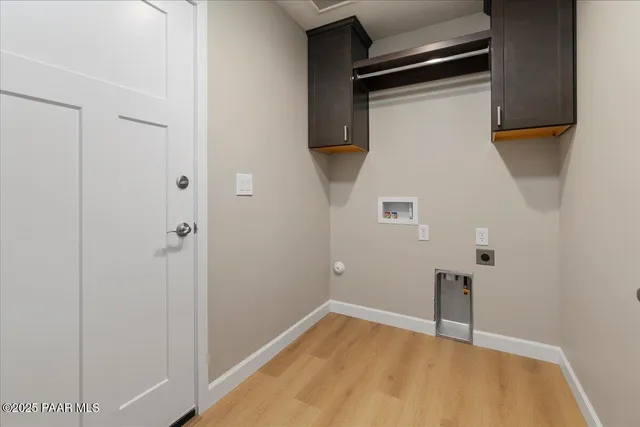 a view of small space with wooden floor