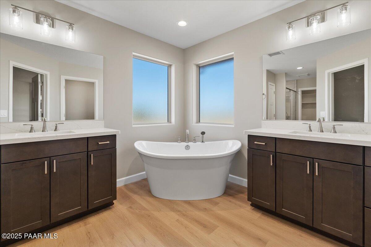 1220 East Cougar Ridge Road Paulden, AZ 86334 - Photo 17 of 30 a spacious bathroom with a double vanity sink mirror and double
