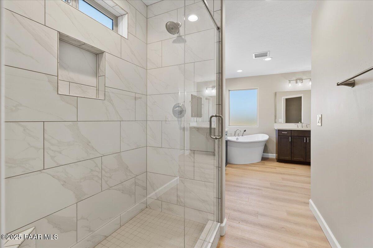 1220 East Cougar Ridge Road Paulden, AZ 86334 - Photo 18 of 30 a bathroom with a toilet and a shower