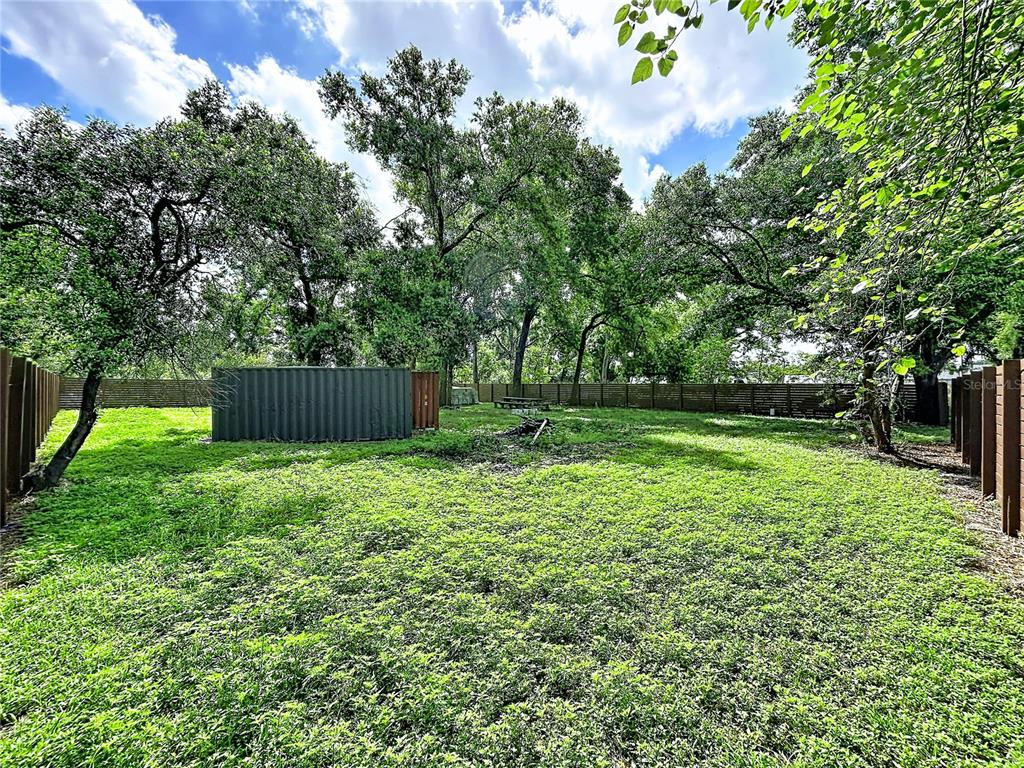 1029 Robson Avenue Seffner, FL 33584 - Photo 6 of 7 a view of backyard with green space