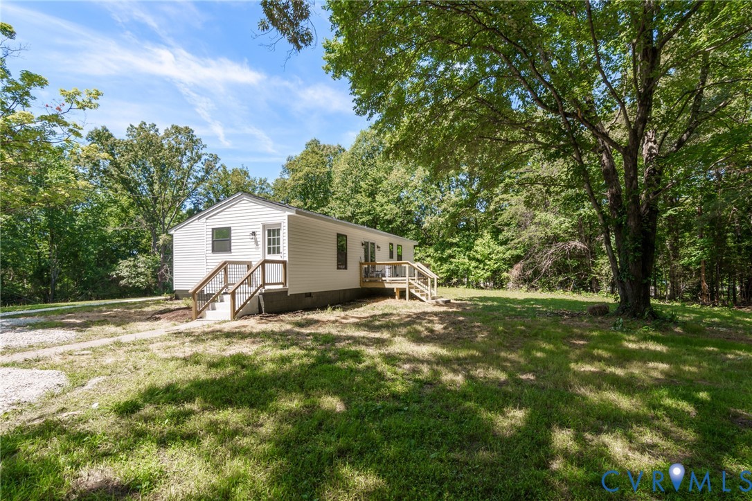 3056 Davis Mill Road Goochland, VA 23063 - Photo 42 of 46 White siding exterior featuring black-framed windo