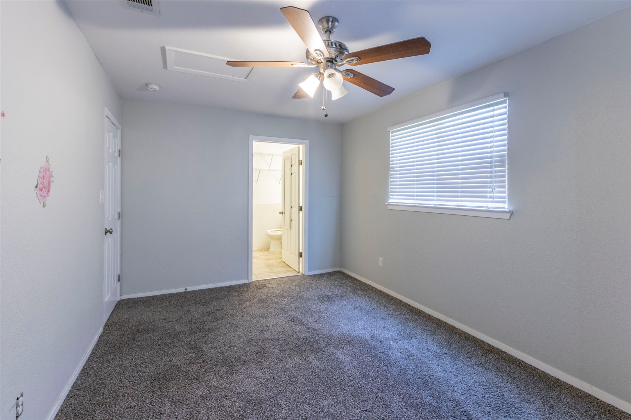 2903 Rogge Lane Austin, TX 78723 - Photo 11 of 26 a view of an empty room with window and chandelier fan