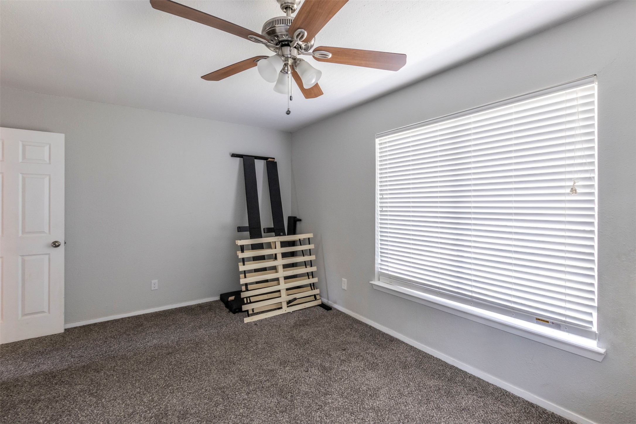 2903 Rogge Lane Austin, TX 78723 - Photo 15 of 26 a view of room with window and ceiling fan