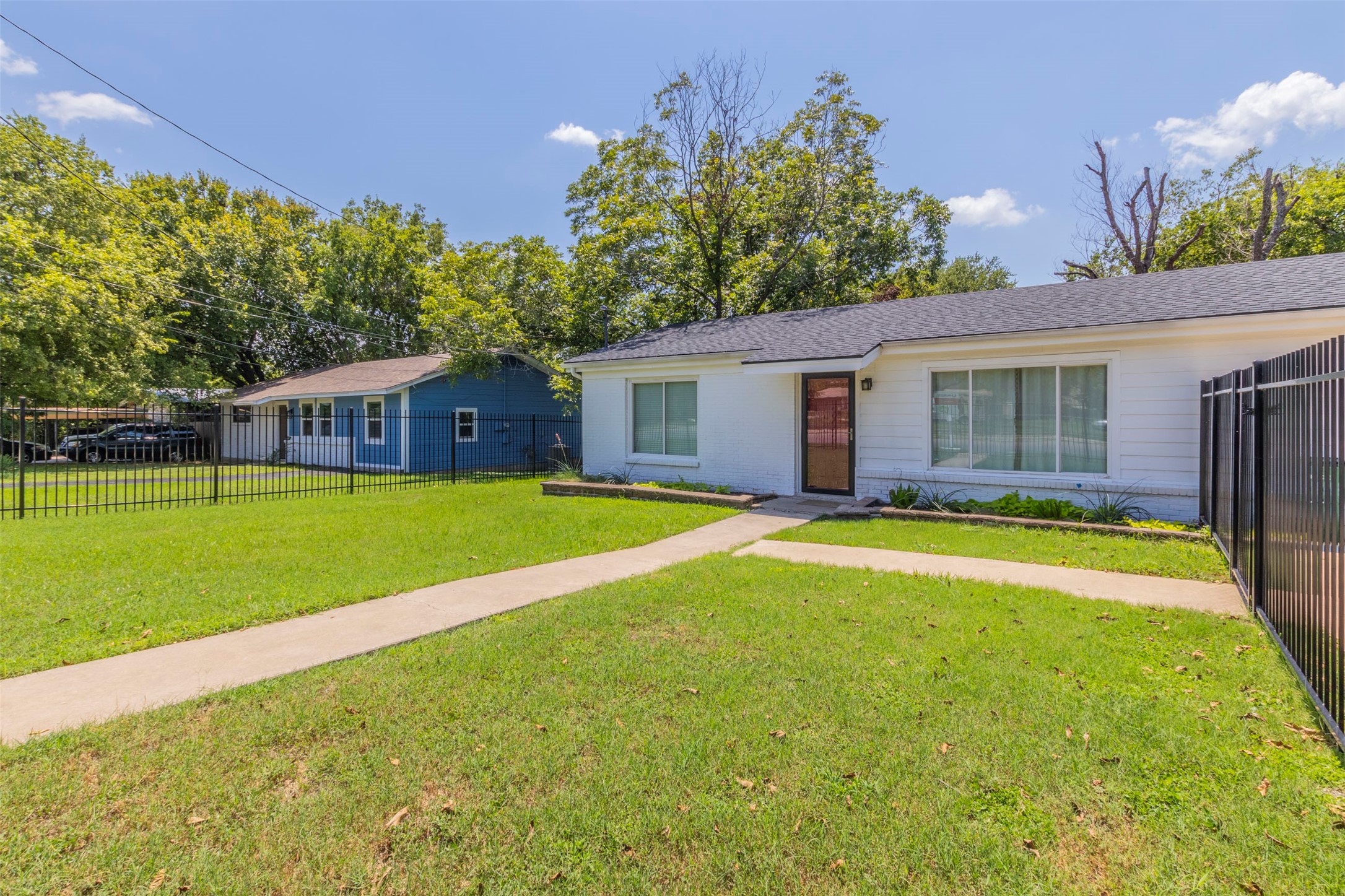 2903 Rogge Lane Austin, TX 78723 - Photo 22 of 26 a view of house with swimming pool and yard