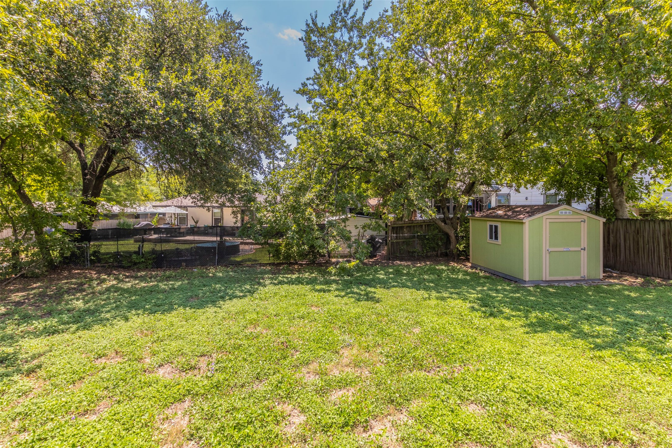 2903 Rogge Lane Austin, TX 78723 - Photo 25 of 26 a view of a house with a yard