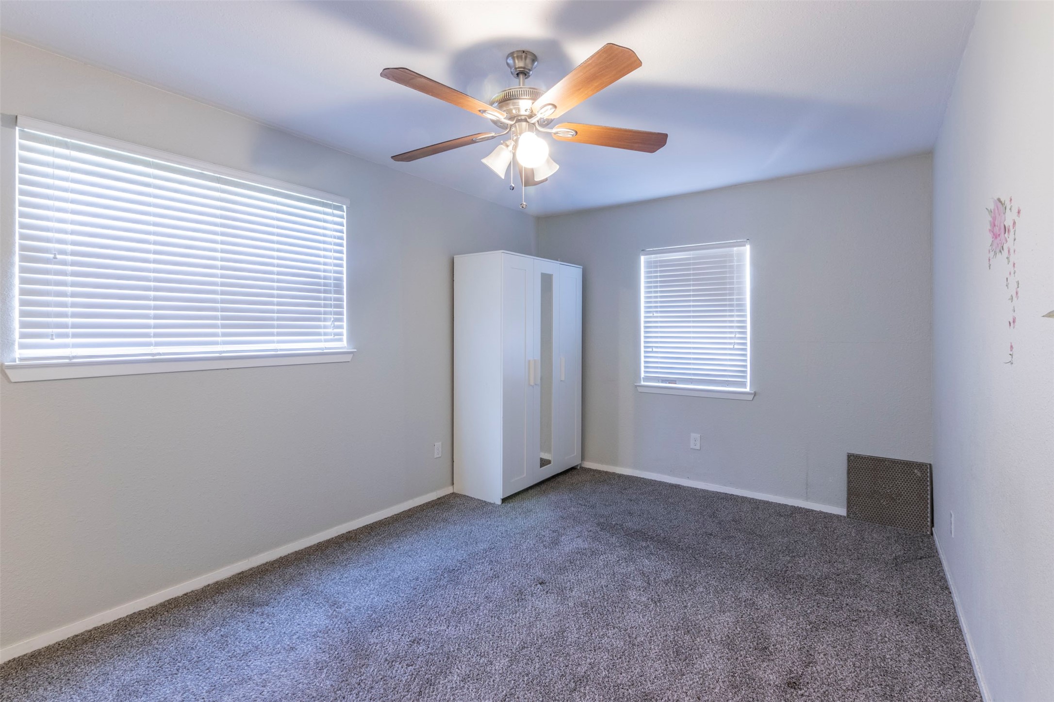 2903 Rogge Lane Austin, TX 78723 - Photo 9 of 26 a view of an empty room with a window