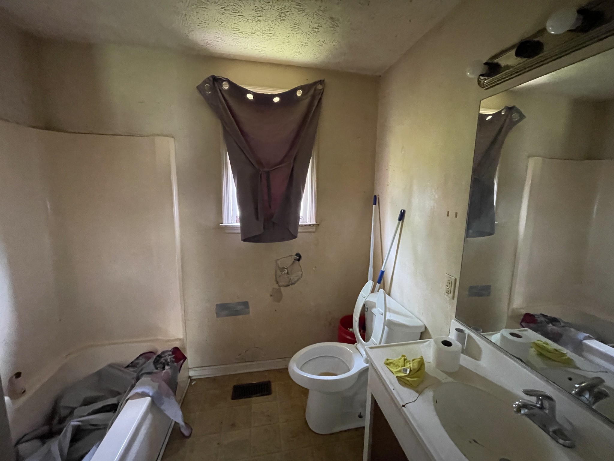 104 Pleasant Drive Smyrna, TN 37167 - Photo 14 of 17 a bathroom with a toilet sink and mirror