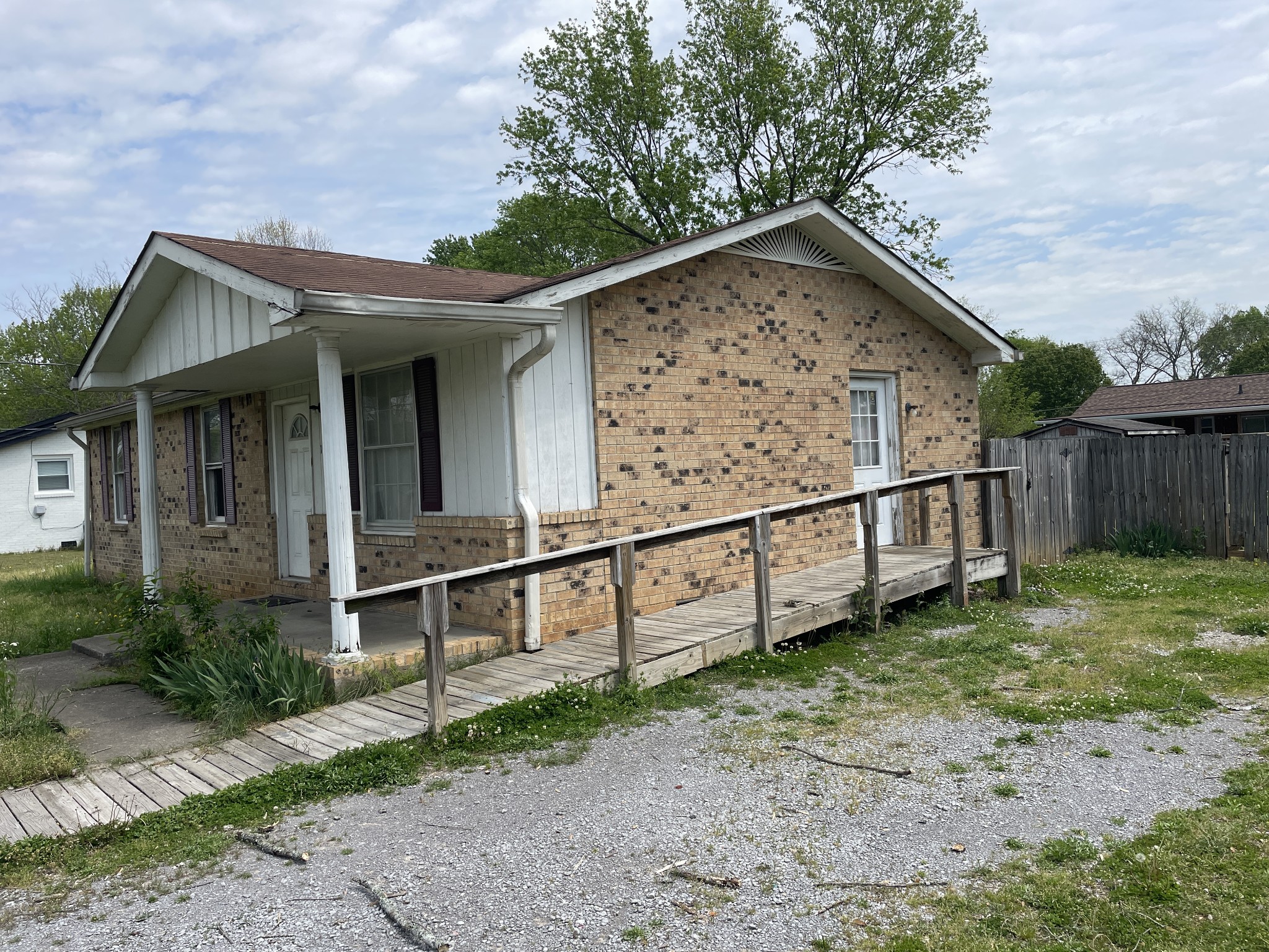 104 Pleasant Drive Smyrna, TN 37167 - Photo 3 of 17 a view of a house with wooden fence