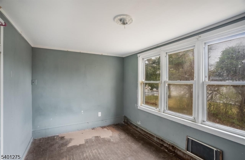 613 South New York Road Absecon, NJ 08205 - Photo 15 of 18 a view of an empty room with a window