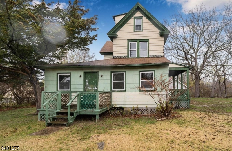 613 South New York Road Absecon, NJ 08205 - Photo 17 of 18 a front view of a house with a yard