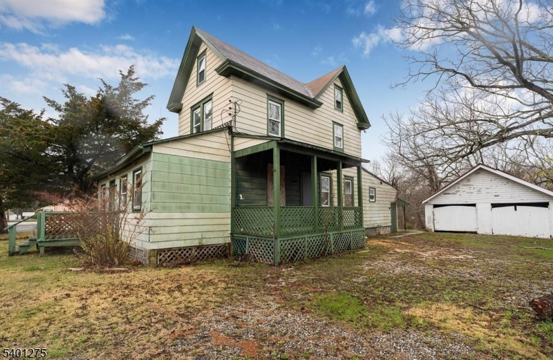 613 South New York Road Absecon, NJ 08205 - Photo 6 of 18 a view of a house with a yard