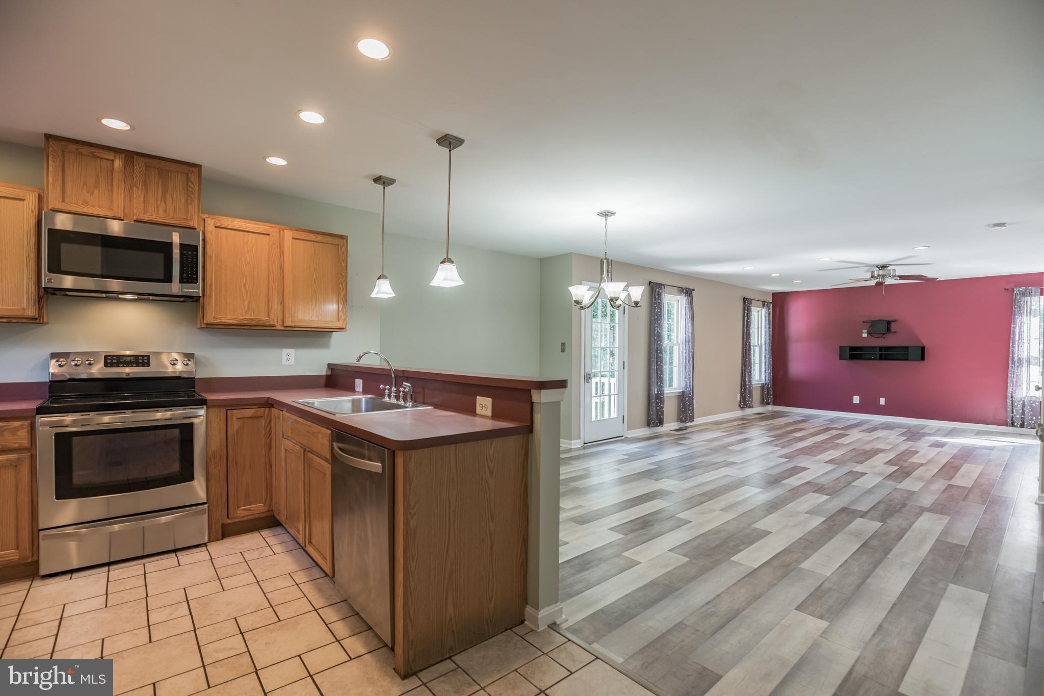 1755 Lottie Fowler Road Prince Frederick, MD 20678 - Photo 11 of 31 Kitchen overlooks Dining Room/Family Room