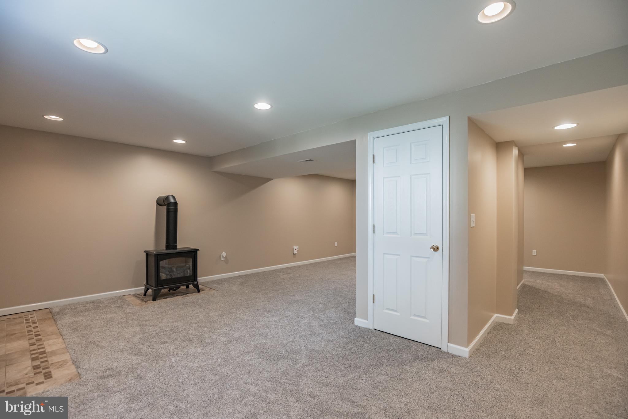1755 Lottie Fowler Road Prince Frederick, MD 20678 - Photo 22 of 31 Basement Rec Room w/gas fireplace