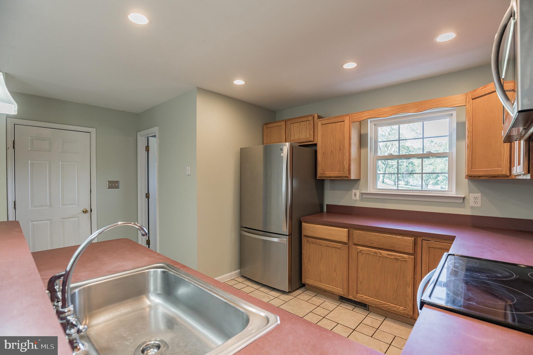 1755 Lottie Fowler Road Prince Frederick, MD 20678 - Photo 10 of 31 Kitchen w/large pantry, ceramic tile