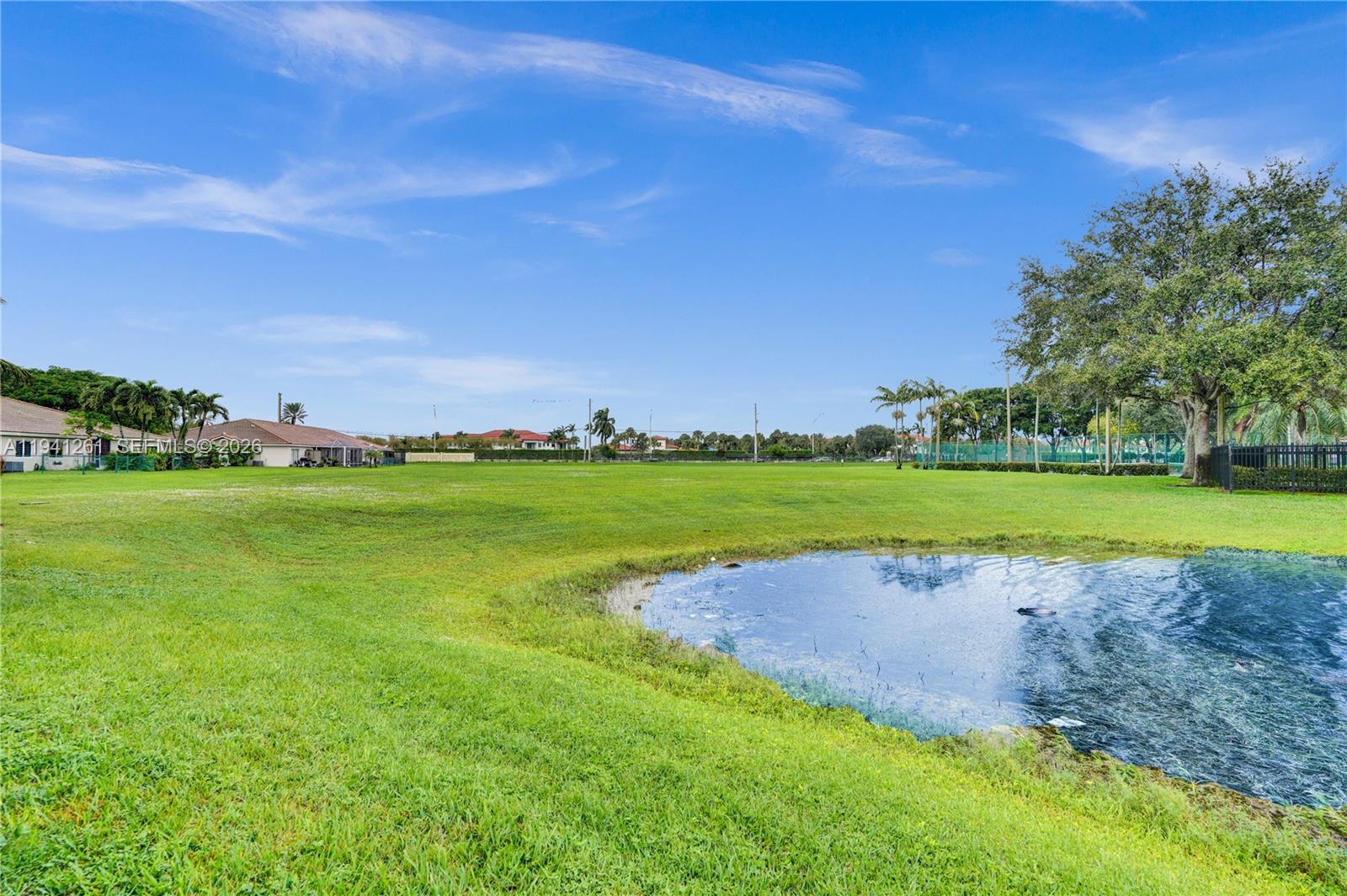 1851 Southwest 116th Way Miramar, FL 33025 - Photo 25 of 30 a view of field with grass and trees