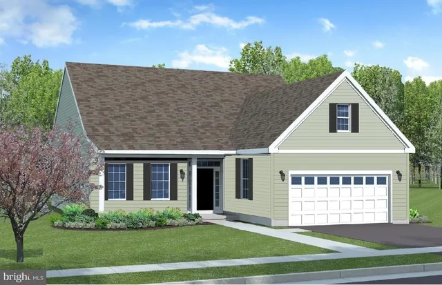 a view of a house with a yard and potted plants