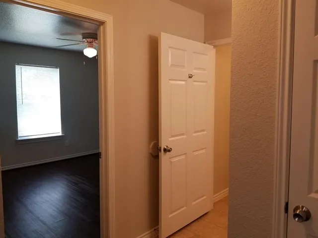a view of a bathroom with a glass door