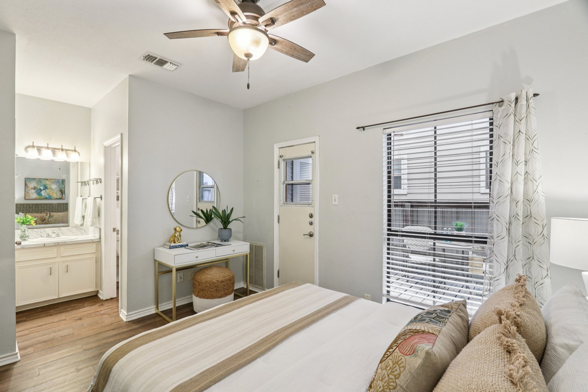 4401 Speedway, Unit 105 Austin, TX 78751 - Photo 27 of 38 The bedroom layout blends comfort and style, making this cozy space feel bigger than its footprint.