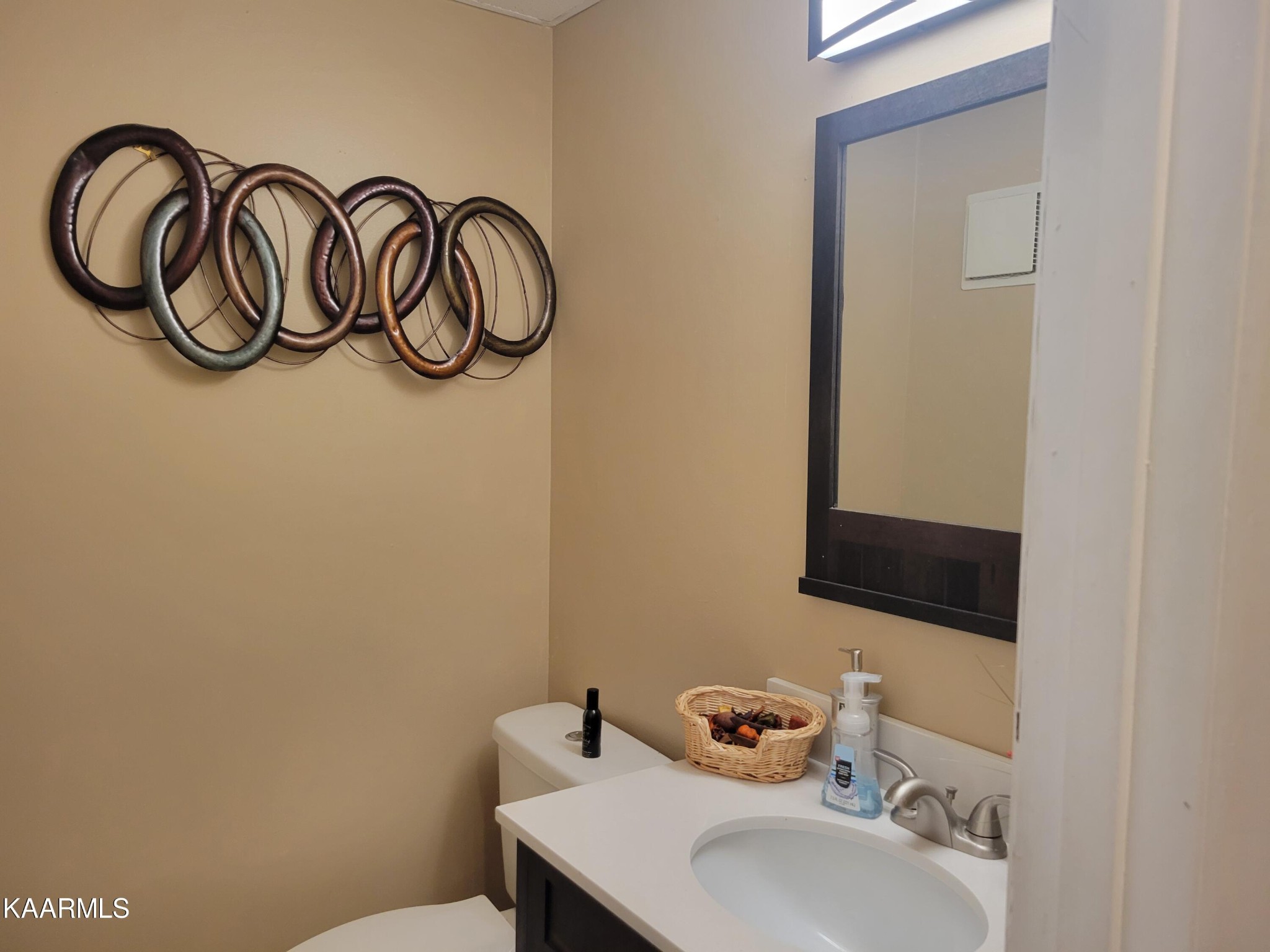 882 Proffitt Springs Road Maryville, TN 37801 - Photo 10 of 16 a bathroom with a sink and a mirror